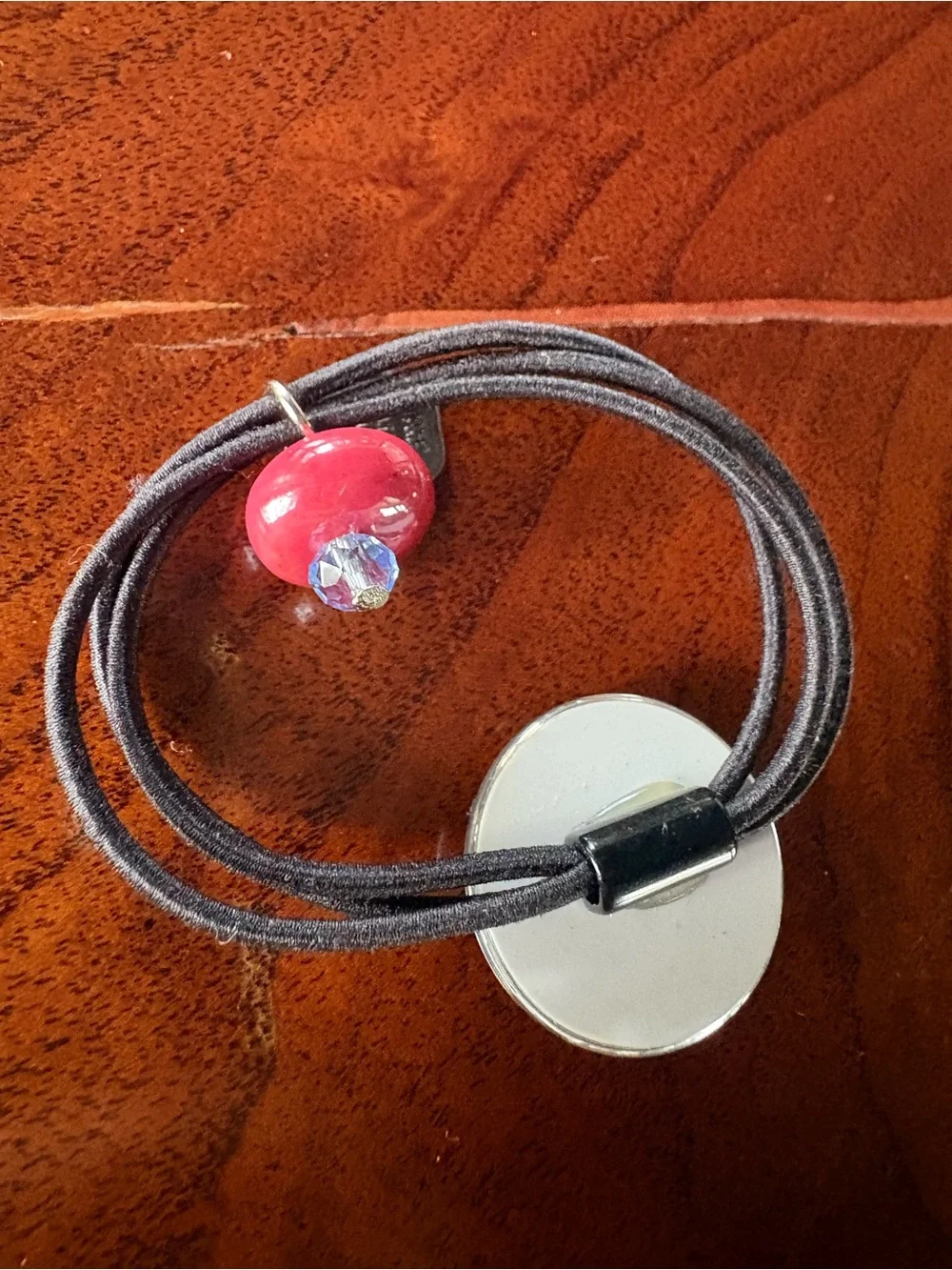 CHANEL Black Hair Tie with White Interlocking CC and Pink Bead
